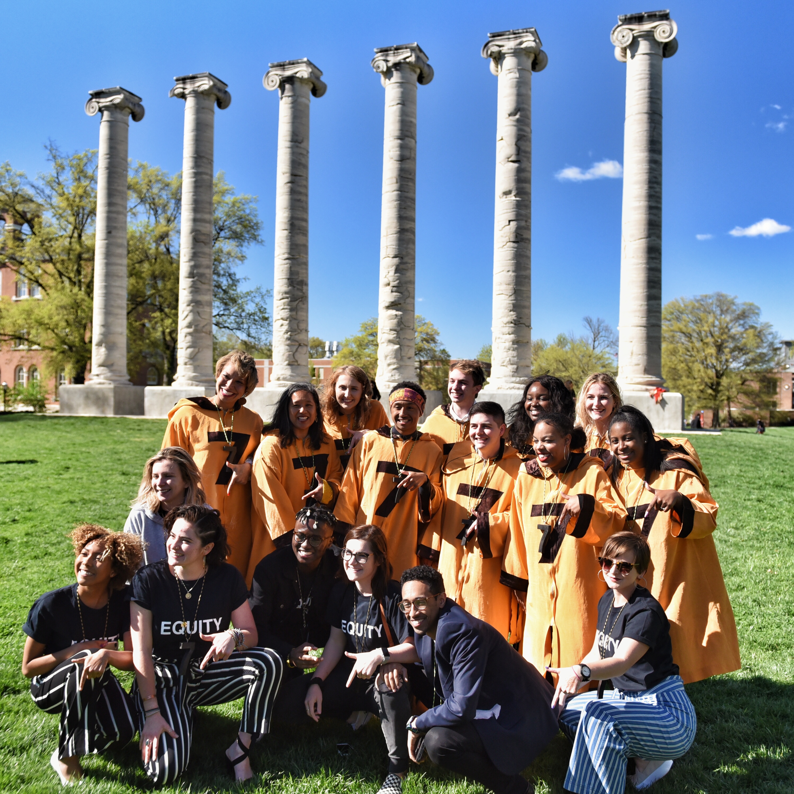 Group photo of new Mystical Seven Members on the Quad