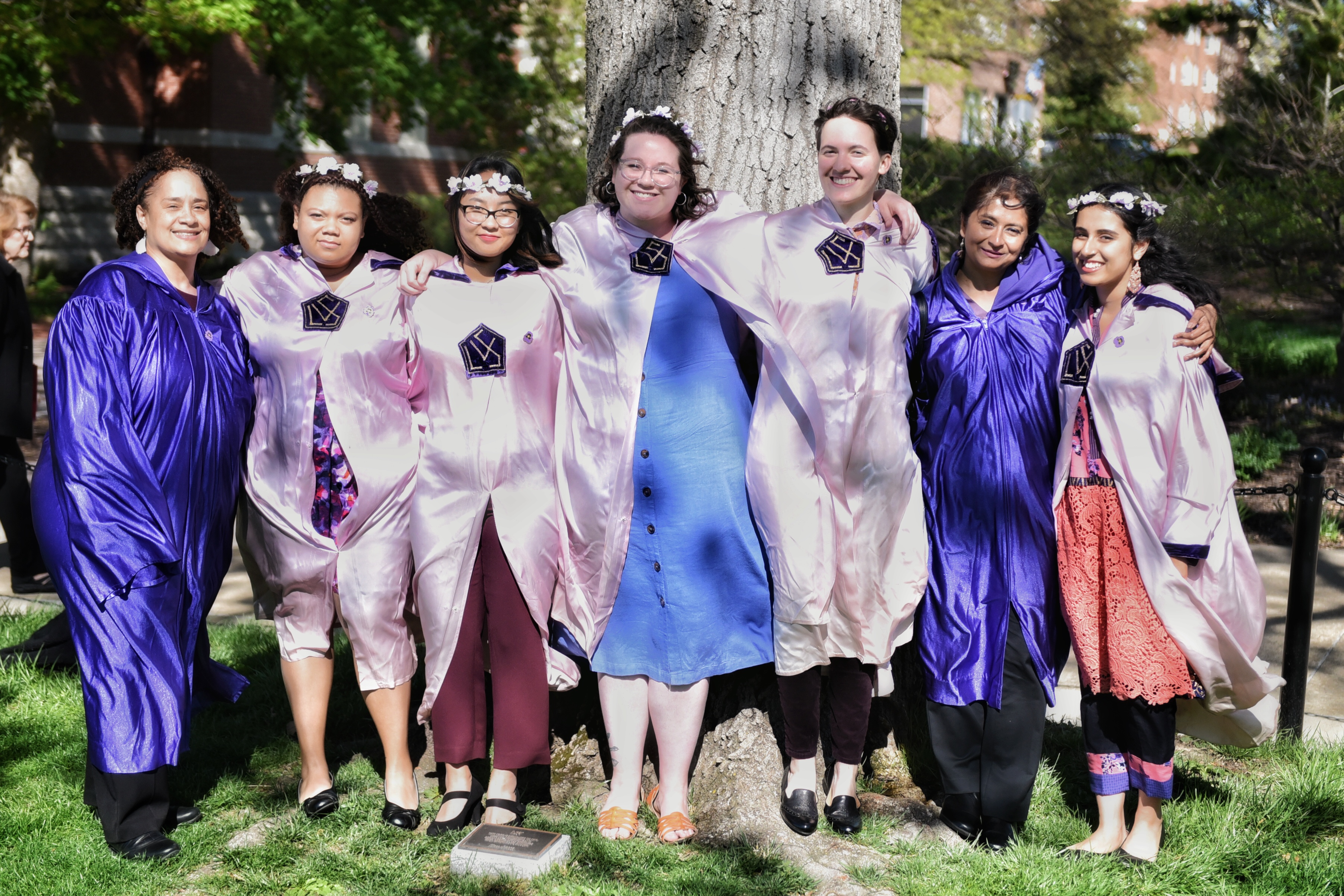 Group photo of new LSV members in pink and purple robes