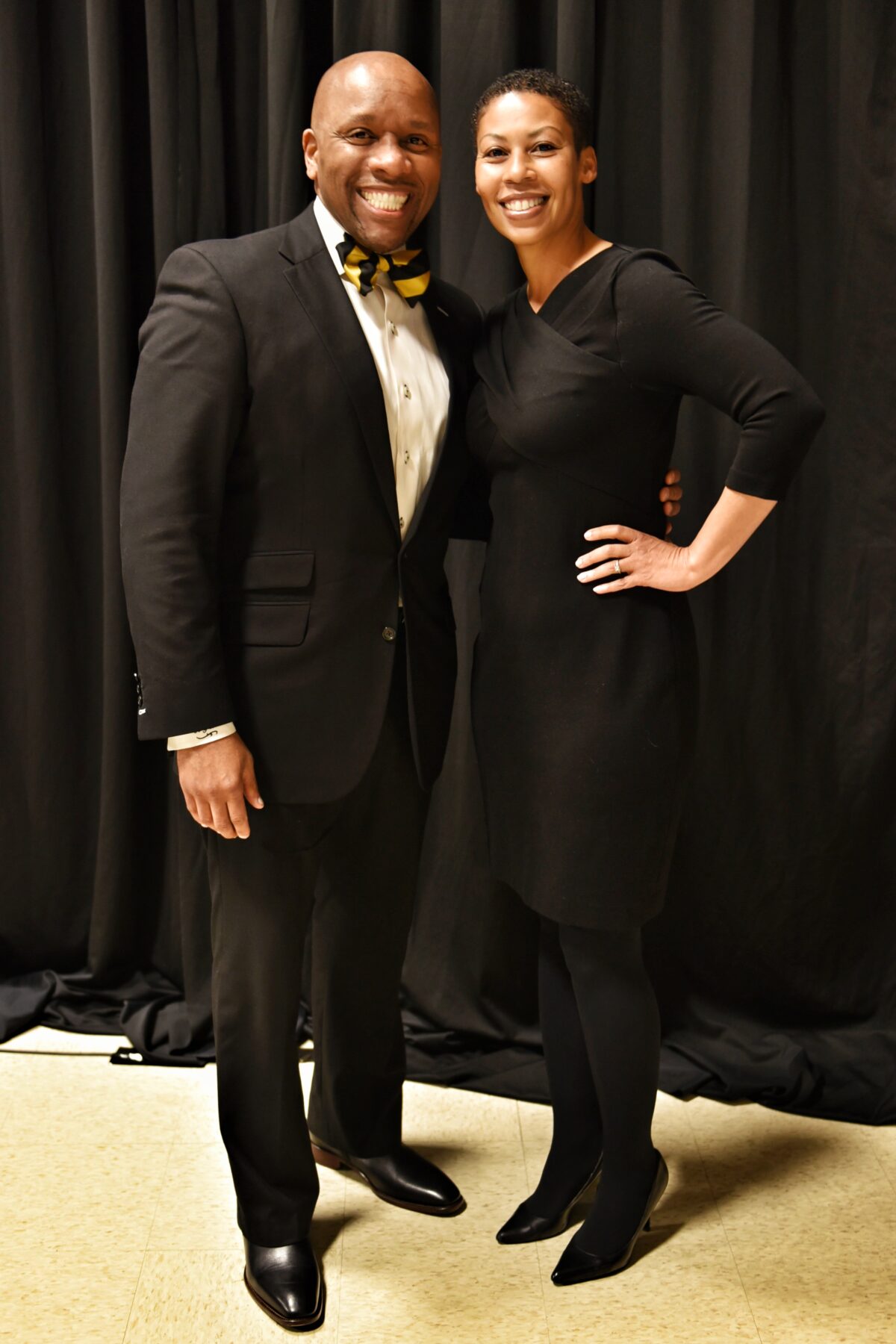 Kevin and Kim McDonald dressed in black for the closing of the Big XII Conference.