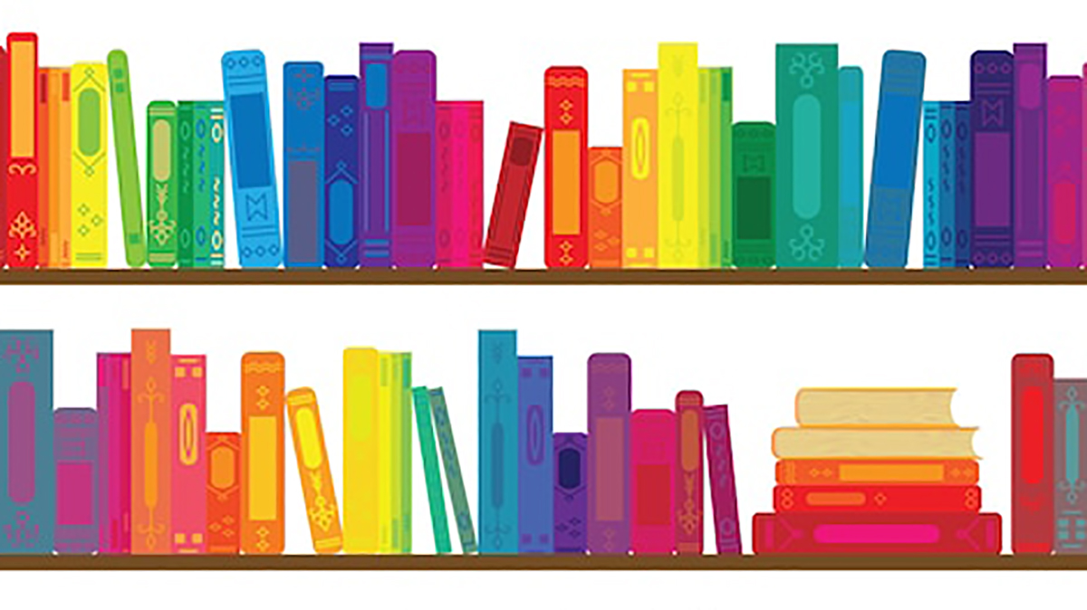 Two shelves of rainbow-colored books
