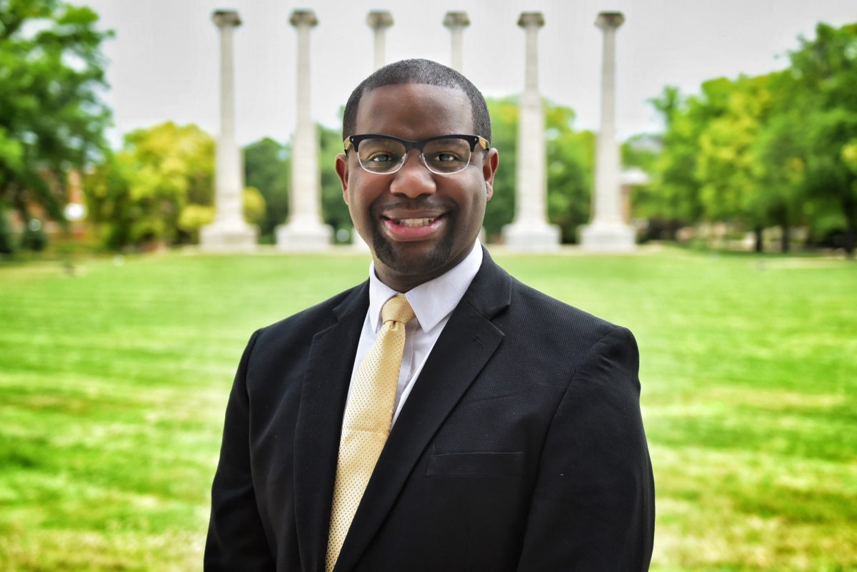 Headshot of Maurice Gipson on the Quad with Columns in the background