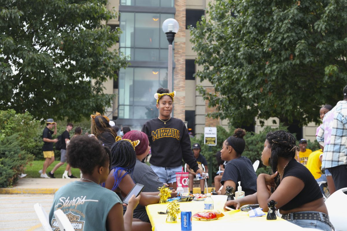 Students, faculty and staff having a great time at the GOBCC homecoming tailgate.