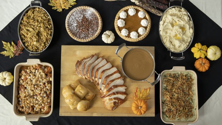This is a photograph of a full, traditional Thanksgiving feast in America.