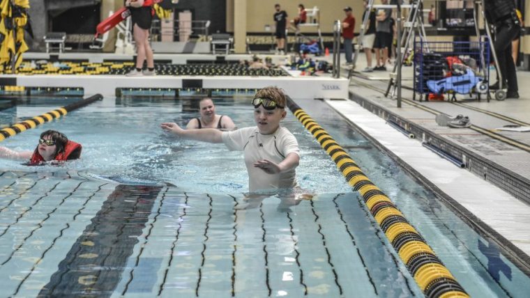 A Special Olympics athlete competes in the aquatics competition at the 2022 State Summer Games in the Mizzou Aquatic Center.