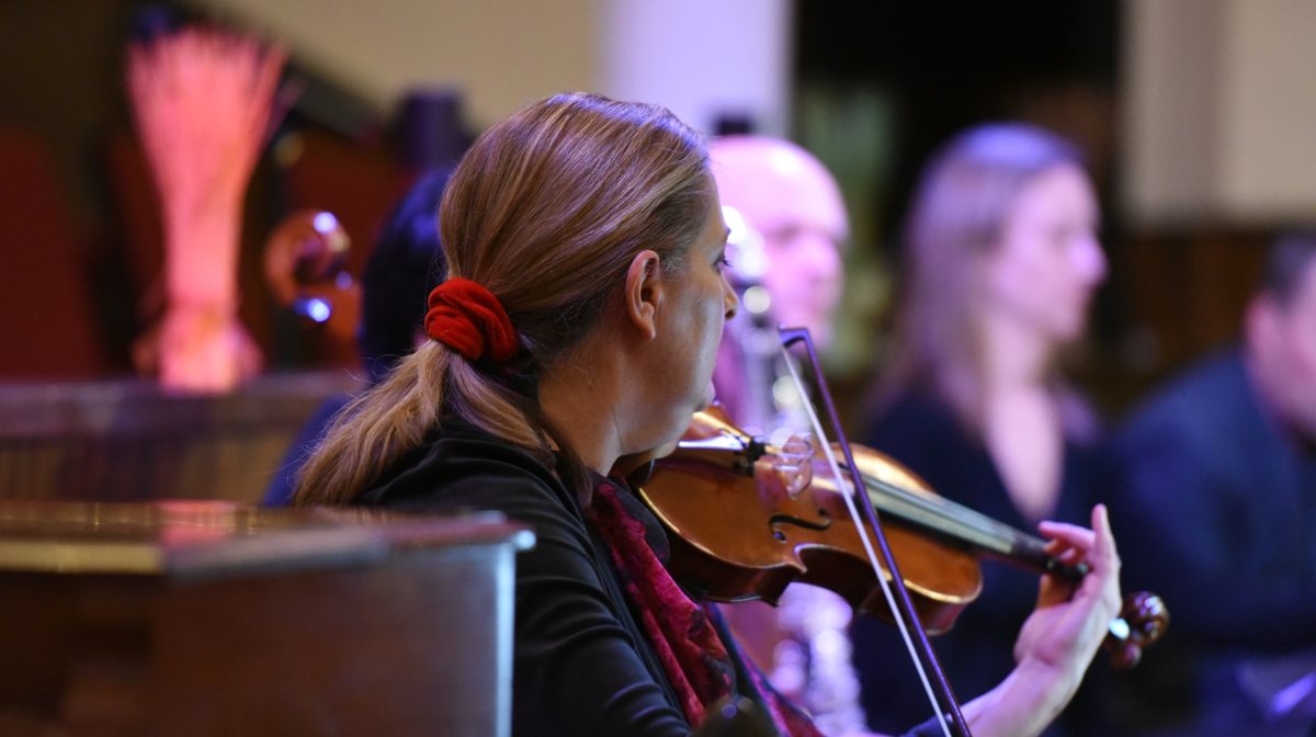 Siri Geenen, violinist, plays eloquently during program. 