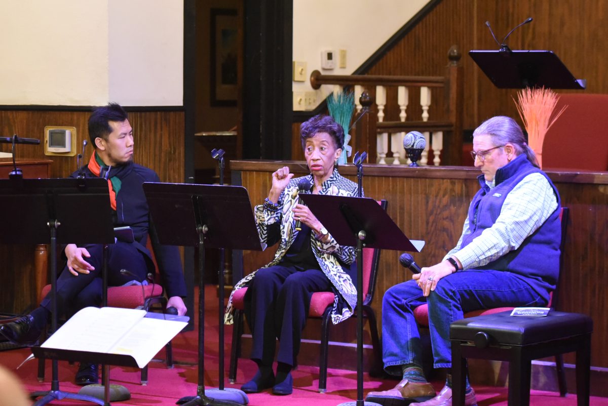 Wilbur Lin, music director at the Missouri Symphony leads panel discussion with historians, Barbra Horell and Greg Olson.