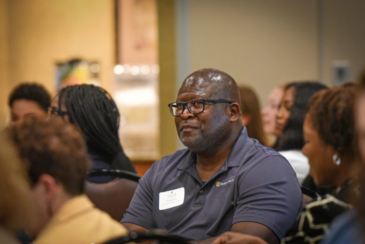 Andre Thorne, Ph.D., director of the Center for Academic Success & Excellence smirks. 
